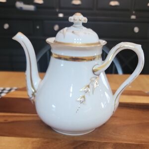 Elegant White and Gold Teapot